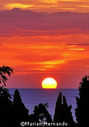 Manado Bay Sunset. by Marian Hernando 